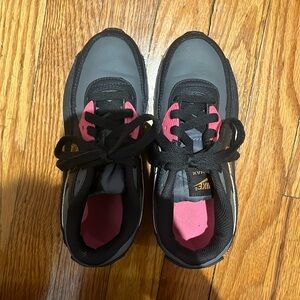 Nike Air sneakers. Black and charcoal gray with hot pink details. Size 2